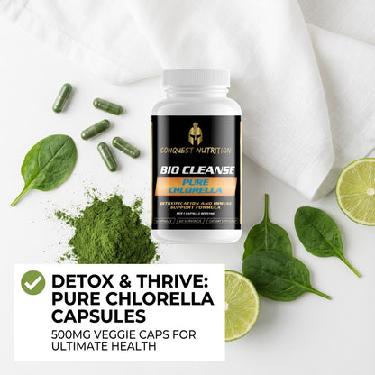 Bottle of Conquest Nutrition Bio Cleanse Pure Chlorella on a white background with green leaves and lime slices.